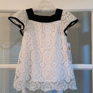 White crochet dress with black trim